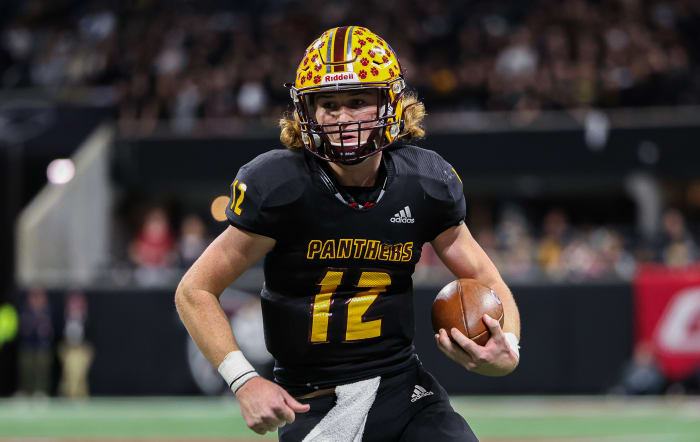 Perry quarterback Colter Ginn is focused as he scrambles for a first down during the Panthers win over Stockbridge in the Georgia 4A state championship game. 12/12/2023